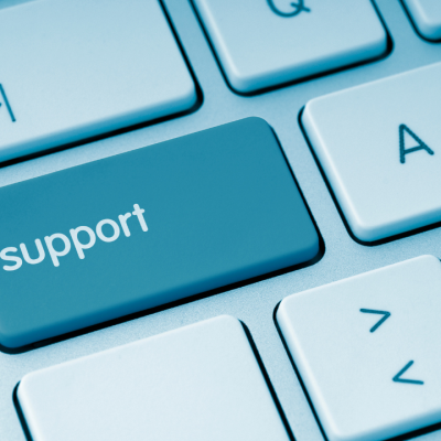 Close-up of a keyboard with a blue “Support” key, representing small business website support and technical assistance.